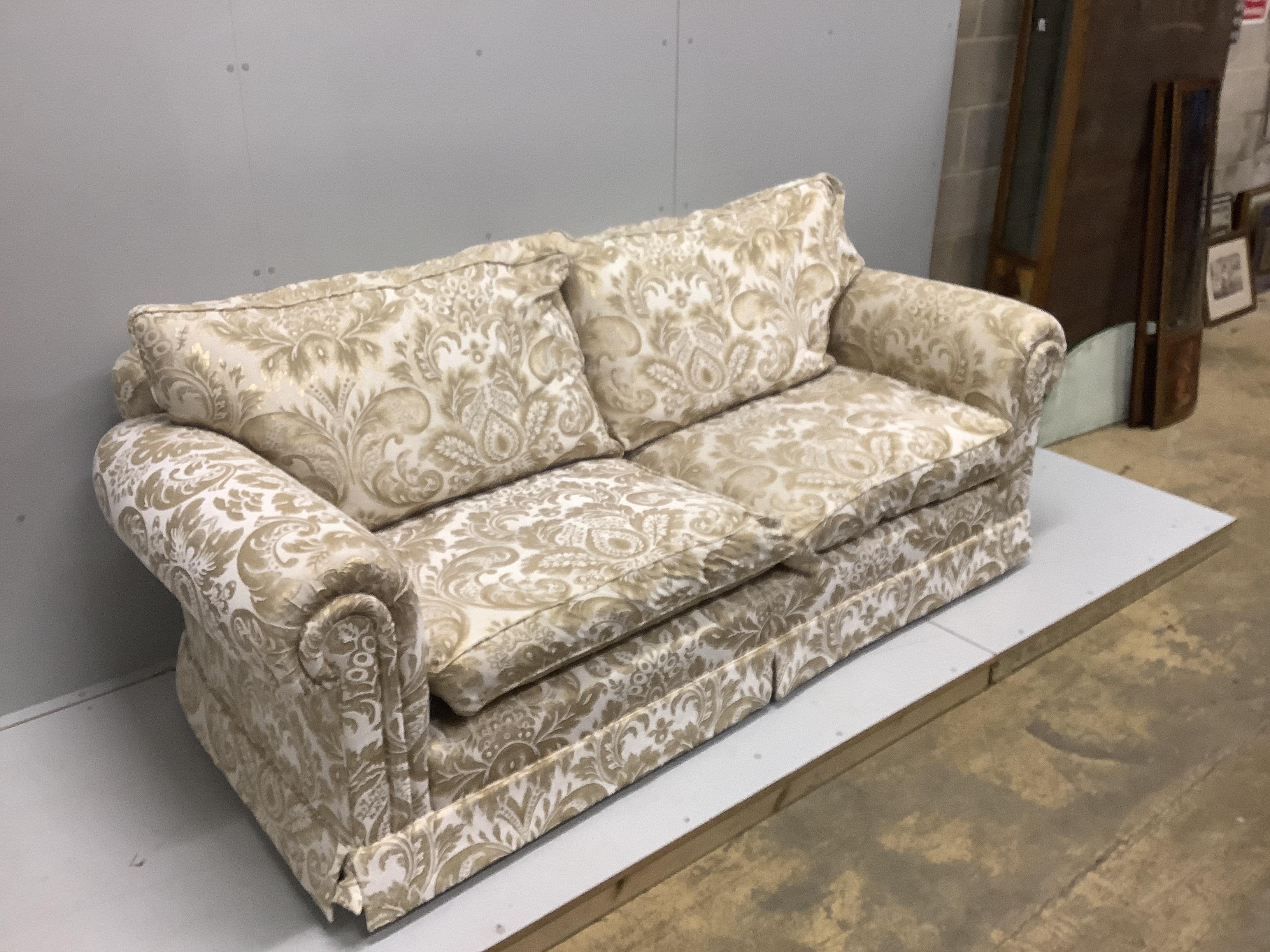 Two Duresta two seat sofas and a matching rectangular footstool, larger sofa width 220cm, depth 96cm, height 96cm